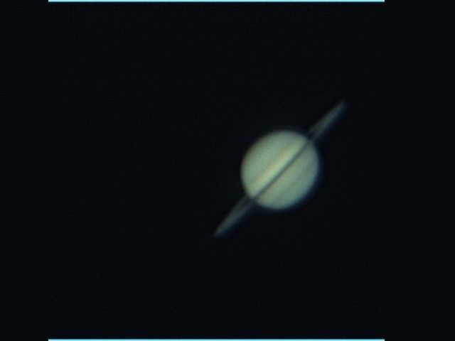 Saturne entre deux nuages, deuxième
