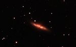 M82 cache cache avec les nuages
