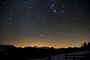 filé d'étoiles (Orion) au dessus des préalpes