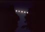 Lune multiple entre arbres